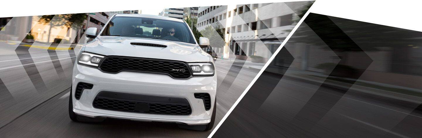 The 2022 Dodge Durango SRT Hellcat being driven on a city street.