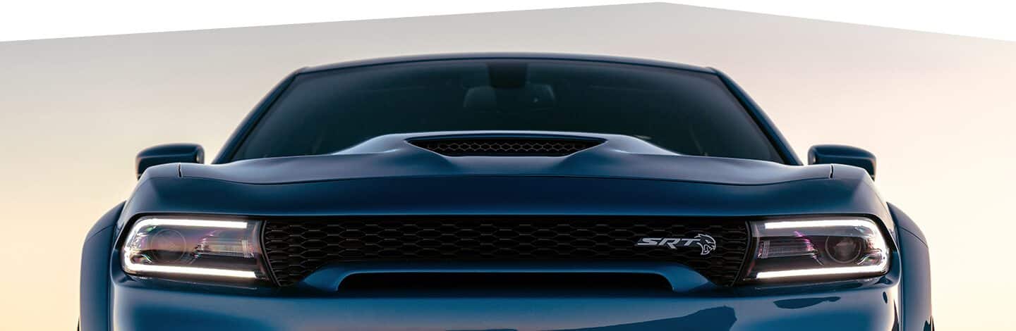 A head-on view of the hood, grille and headlamps on the 2020 Dodge Charger SRT Hellcat Widebody.