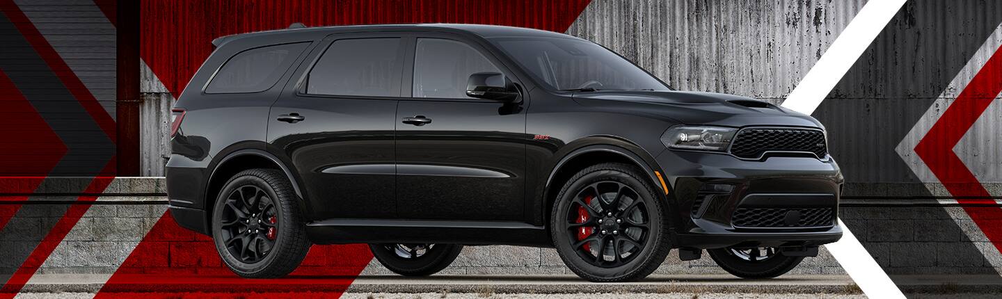 A side profile of the 2023 Dodge Durango SRT Black with a monochrome black appearance.