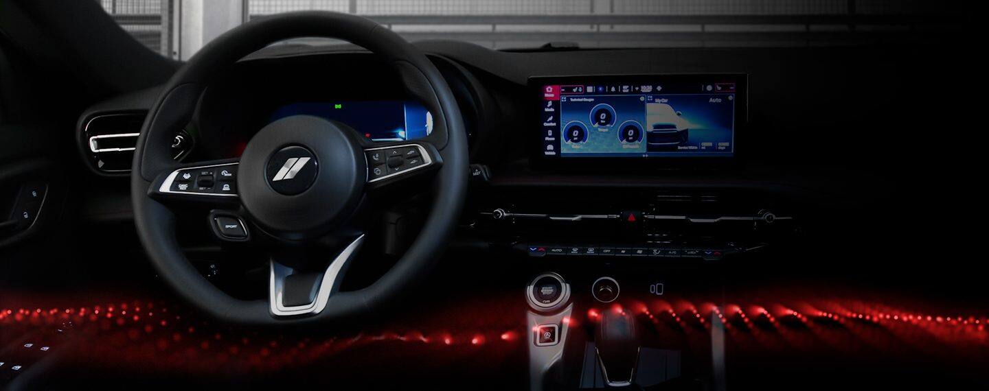 El volante y la pantalla táctil Uconnect en la Dodge Hornet 2023.