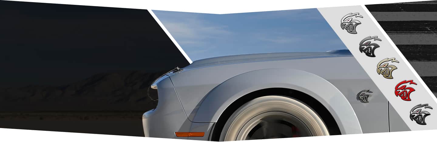 The Hellcat badge on the 2022 Dodge Challenger shown in five different colors.