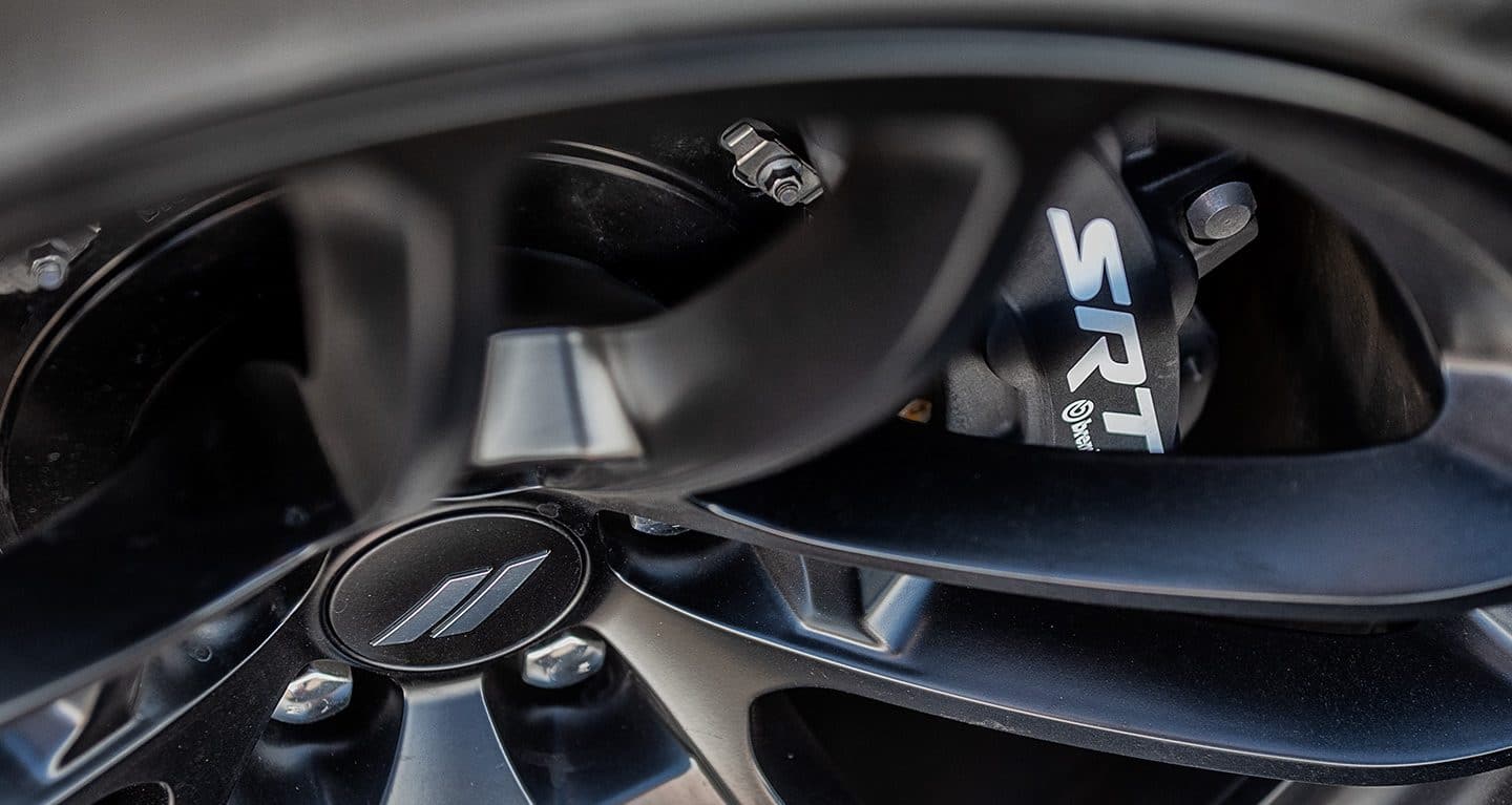 An extreme close-up of a wheel on the 2022 Dodge Charger SRT Hellcat Widebody.