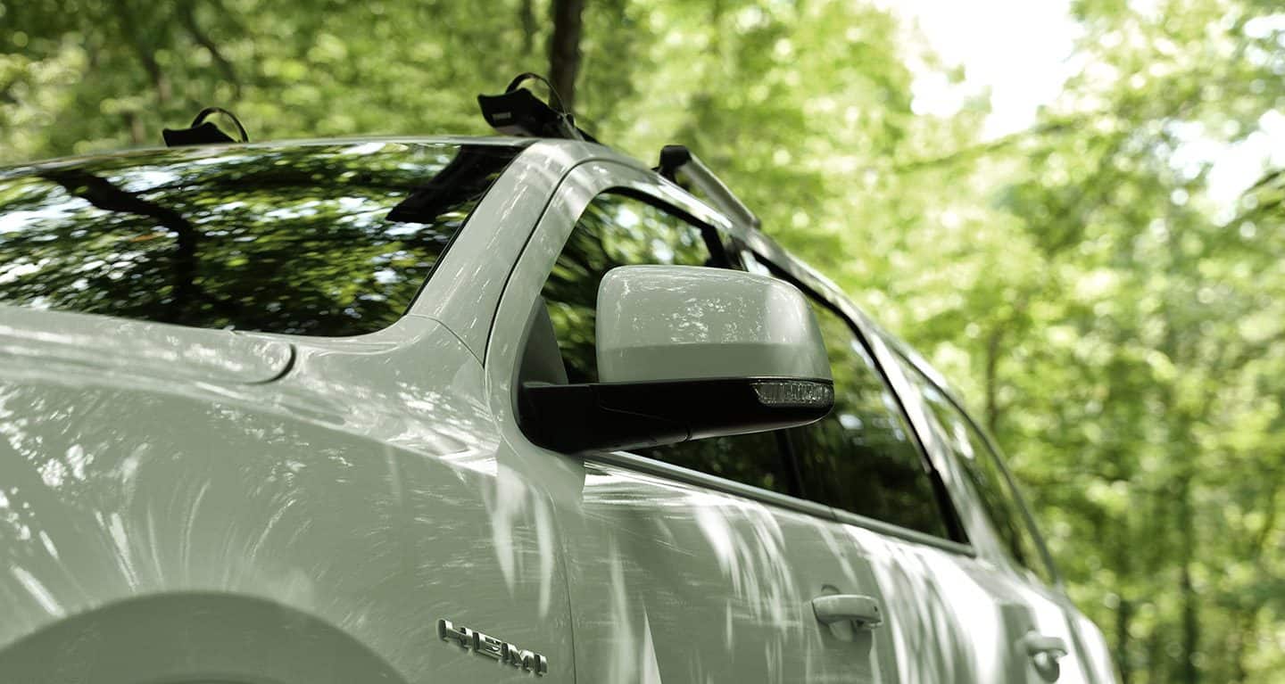 Display The driver-side exterior mirror on the 2022 Dodge Durango R/T.
