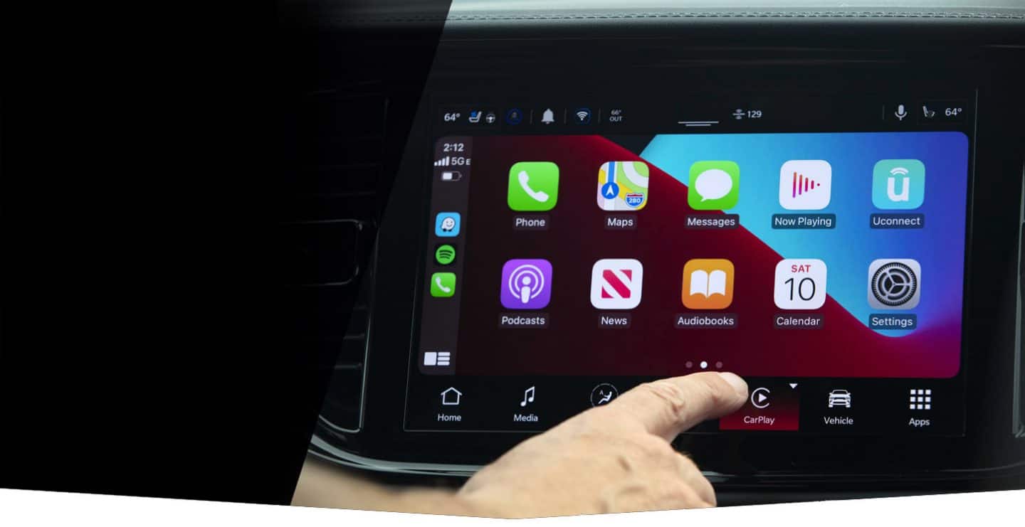 The touchscreen in the 2022 Dodge Durango shows the Gauges screen, with coolant, oil, air intake and transmission oil temperature displayed.