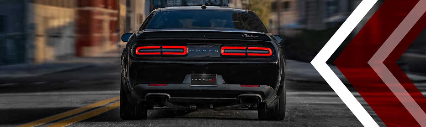 Triple black store dodge challenger