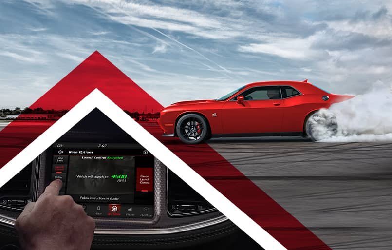 A split screen of a red 2023 Dodge Challenger R/T Scat Pack burning rubber on a track and a close-up of the Uconnect touchscreen displaying the Launch Control Activated screen.