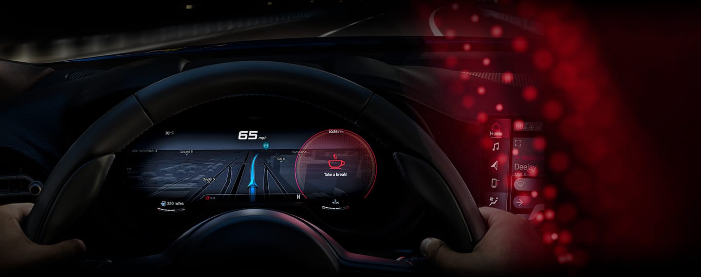 A close-up of the Driver Information Digital Cluster in the 2023 Dodge Hornet displaying "Take a Break" in addition to 65 mph and a navigation map.