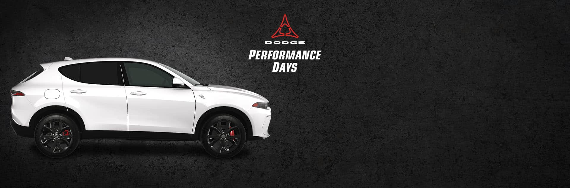 A passenger-side profile of a white 2024 Dodge Hornet R/T. Performance Days Sales Event.