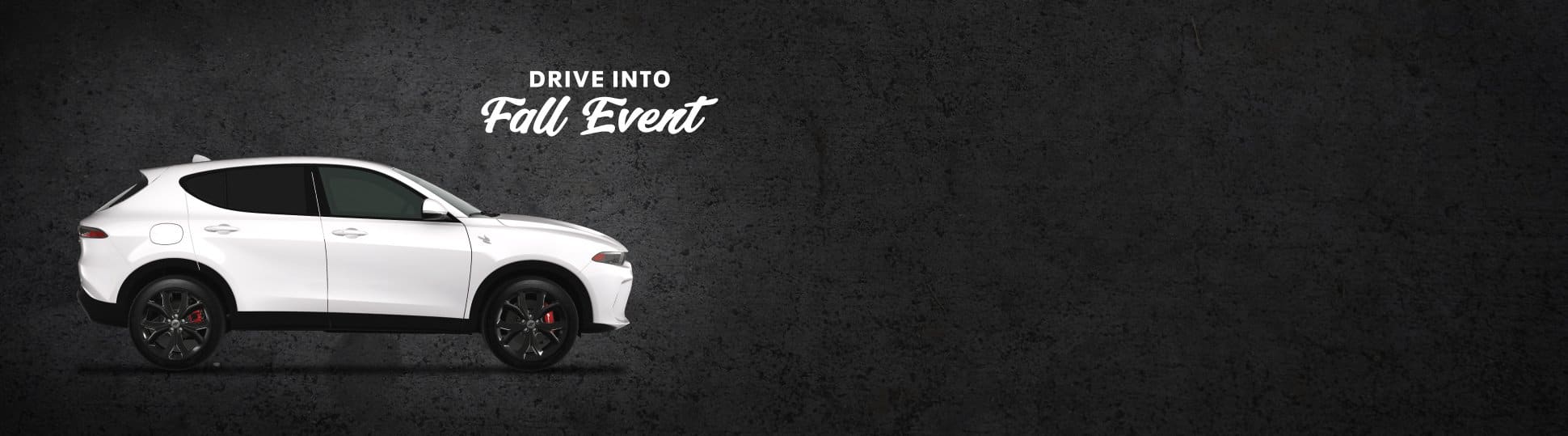 A passenger-side profile of a white 2024 Dodge Hornet R/T. Drive into Fall Event.