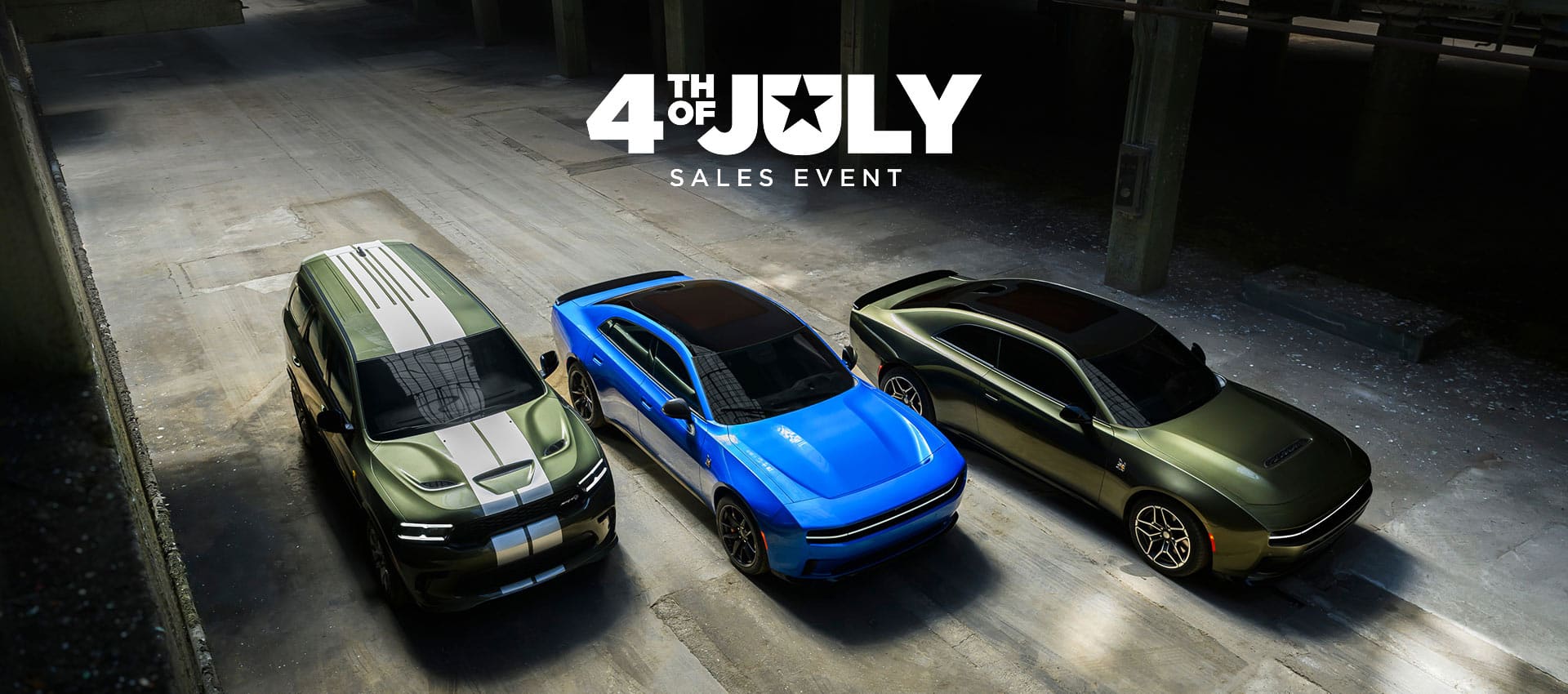 Three 2026 Dodge vehicles beside each other. From left to right a green Durango SRT Hellcat with dual white center stripes, a blue Charger Daytona Scat Pack and a green Charger Scat Pack. 4th of July Sales Event.