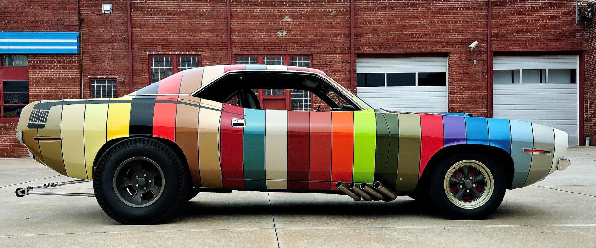 Dodge Challenger painted in stripes of heritage colors